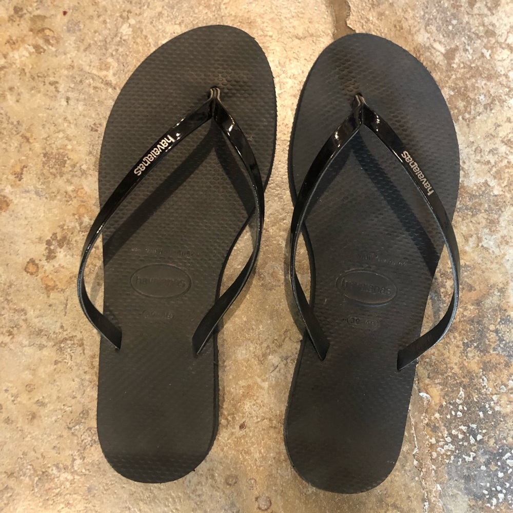 Brand new Haviainas…worn twice. Black with black patent.